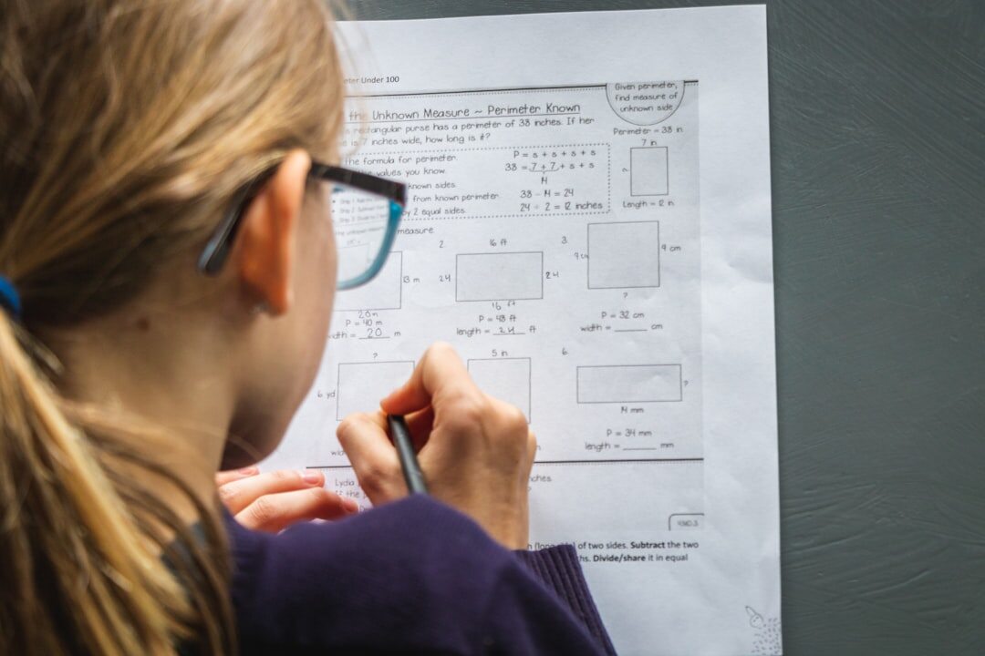 Analyst reviewing charts and graphs on a computer screen